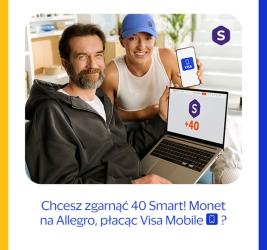 Promocja VISA Mobile. Iga Świątek trzymająca smartfona. Siedzący obok niej Tomasz Kot z laptopem.